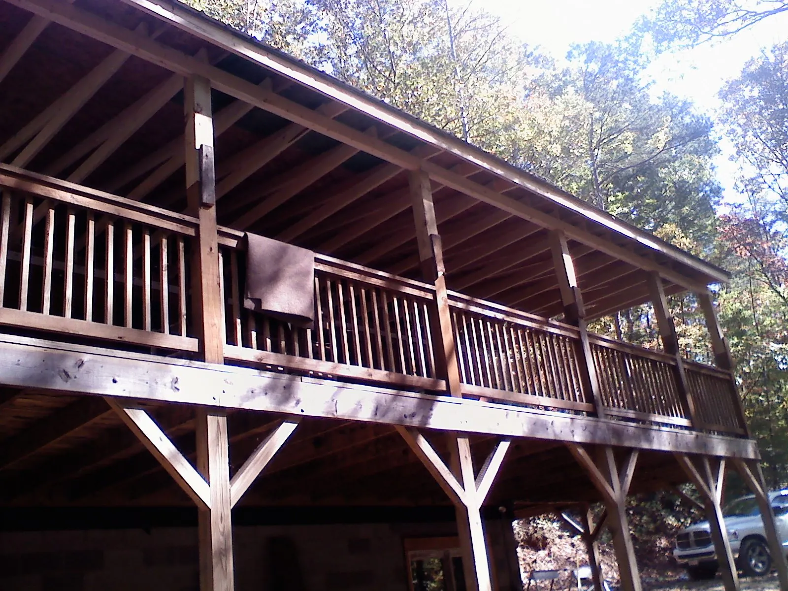 Timber framing under a new elevated porch and deck — Roof Leak Repair in Nassau by Roofing Brothers